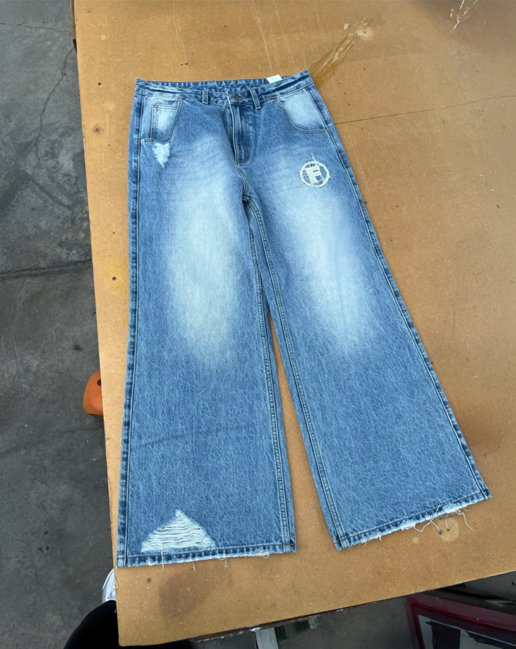 teared up denim jeans