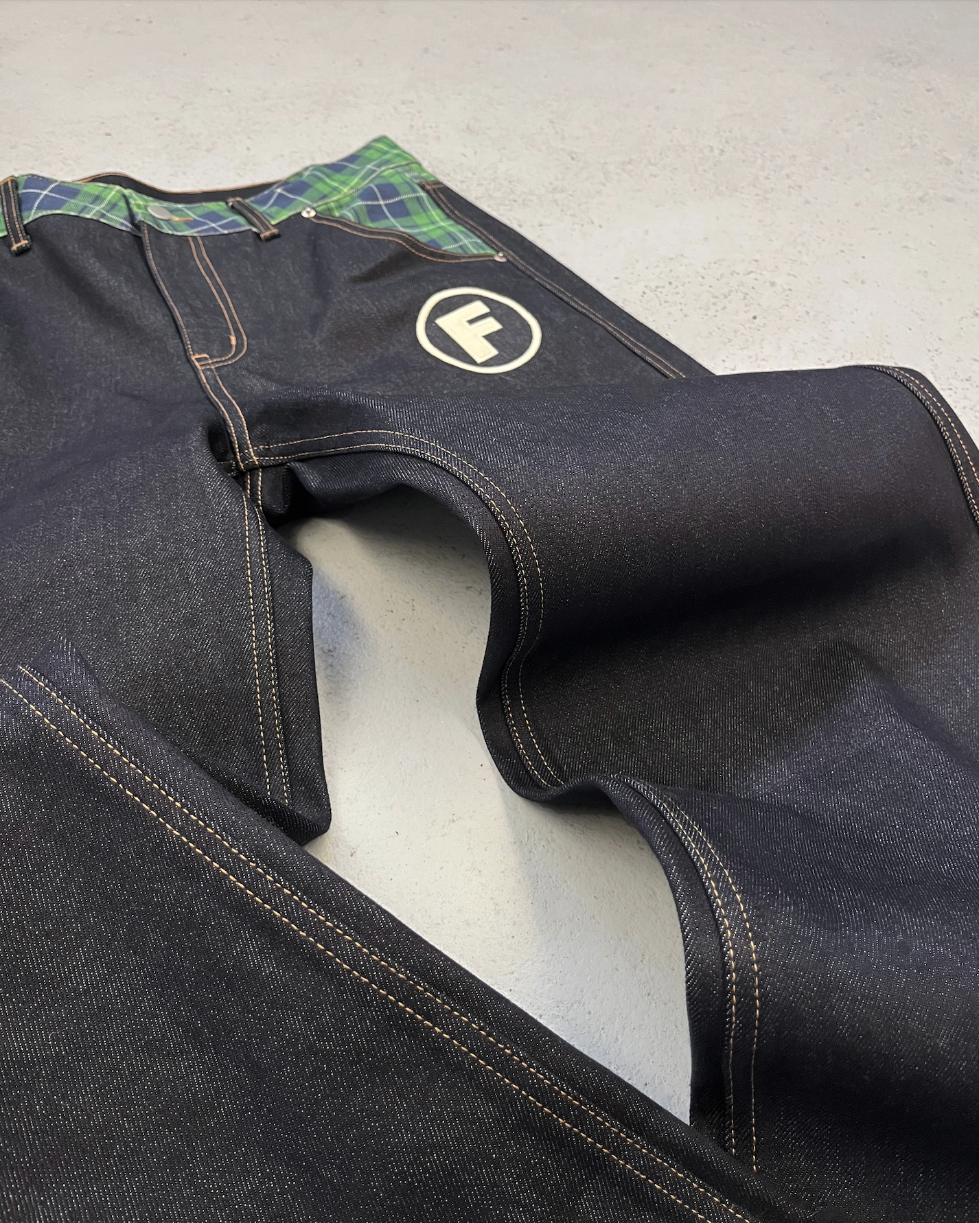 Checkered F denim jeans