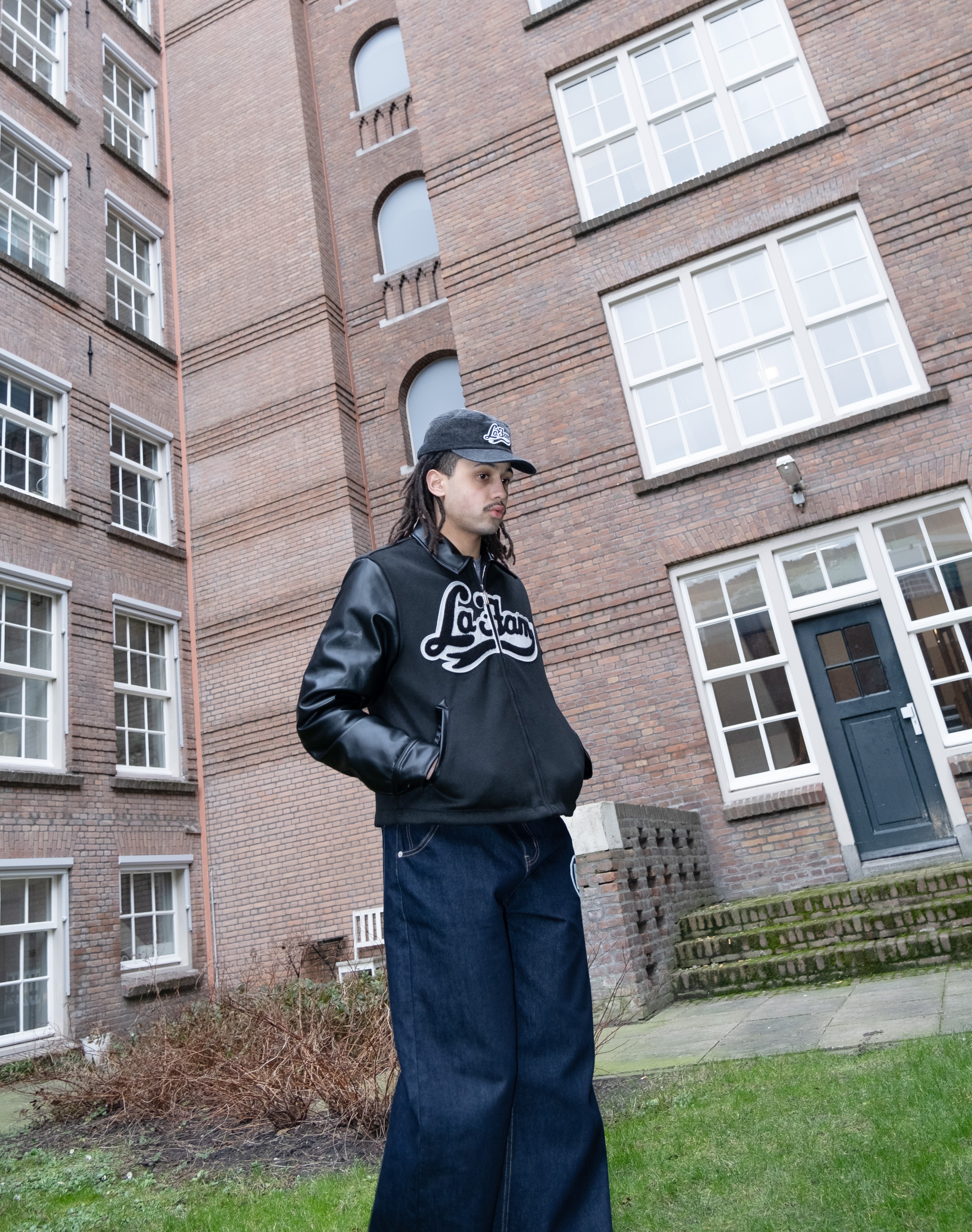 ALL BLACK VARSITY JACKET – La Fam